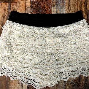 Charlotte Russe cream lace shorts w/black elastic waistband, size M.  (#SUM107)